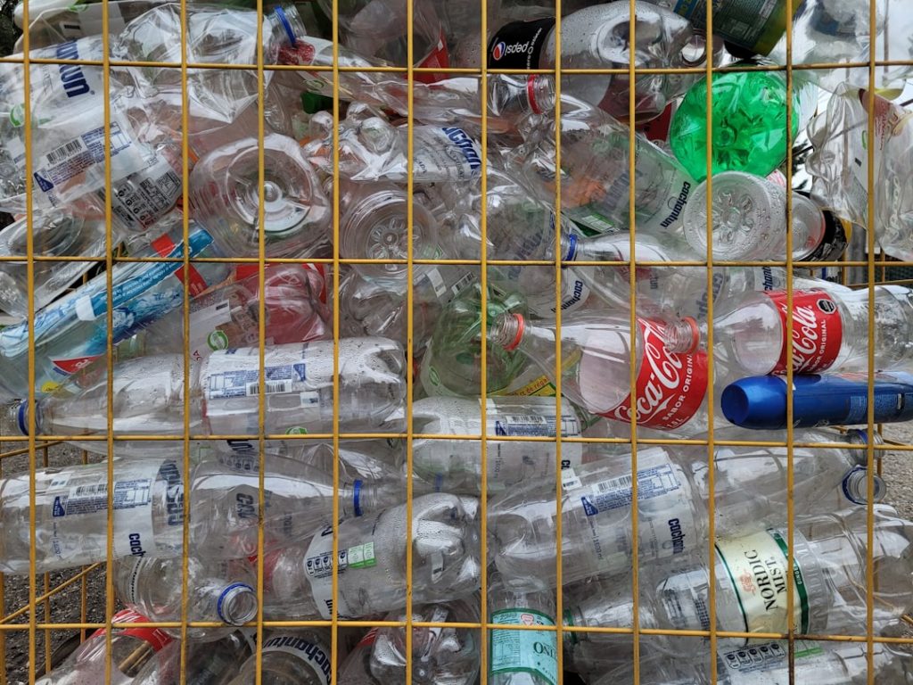 a-bunch-of-bottles-that-are-in-a-cage-ak859jaekls